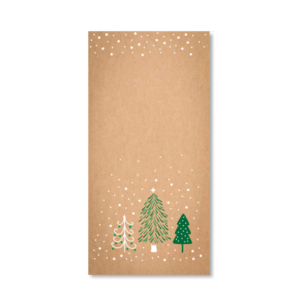 A rectangular kraft paper napkin with a white snowflake pattern and three green Christmas trees near the bottom, shown on a plain white background.